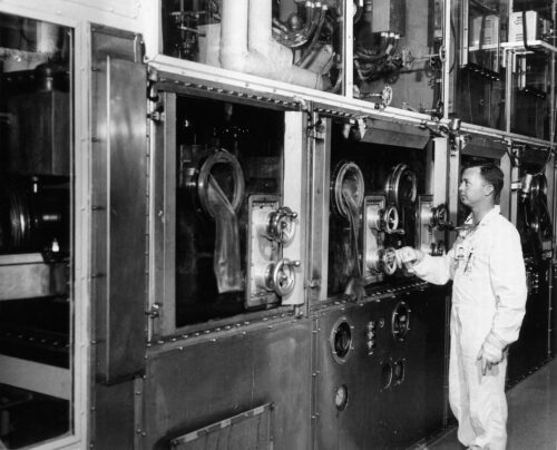 man operating a nuclear reactor
